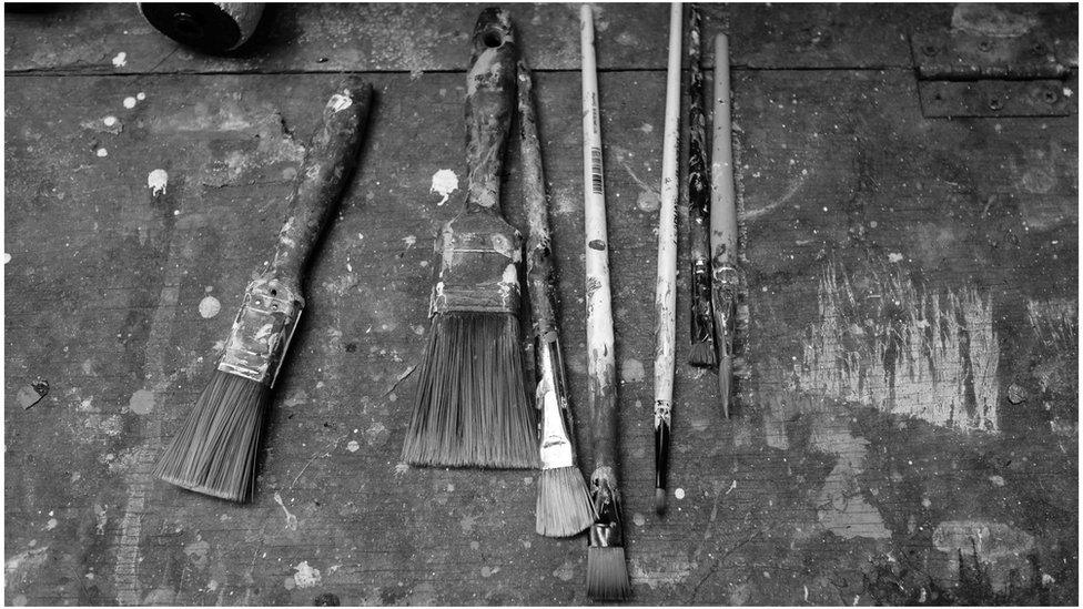 Paint brushes in the paint room