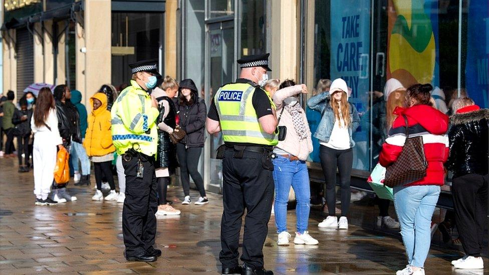 Shoppers queue in Edinburgh