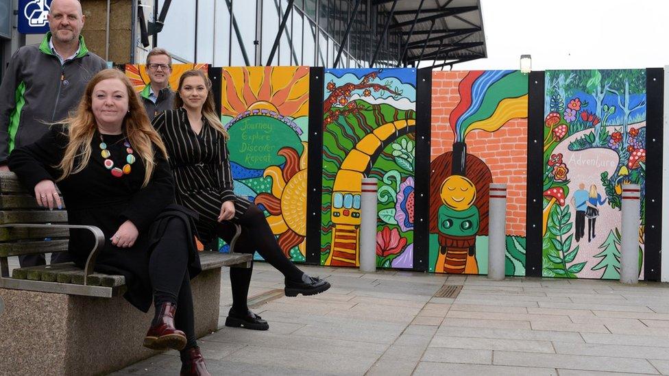 The murals and (front to back) Kerry Cook from the Art Room, Brian Hall from BAM, Roberta Redecke from Sunderland BID and BAM’s Paul Abraham.