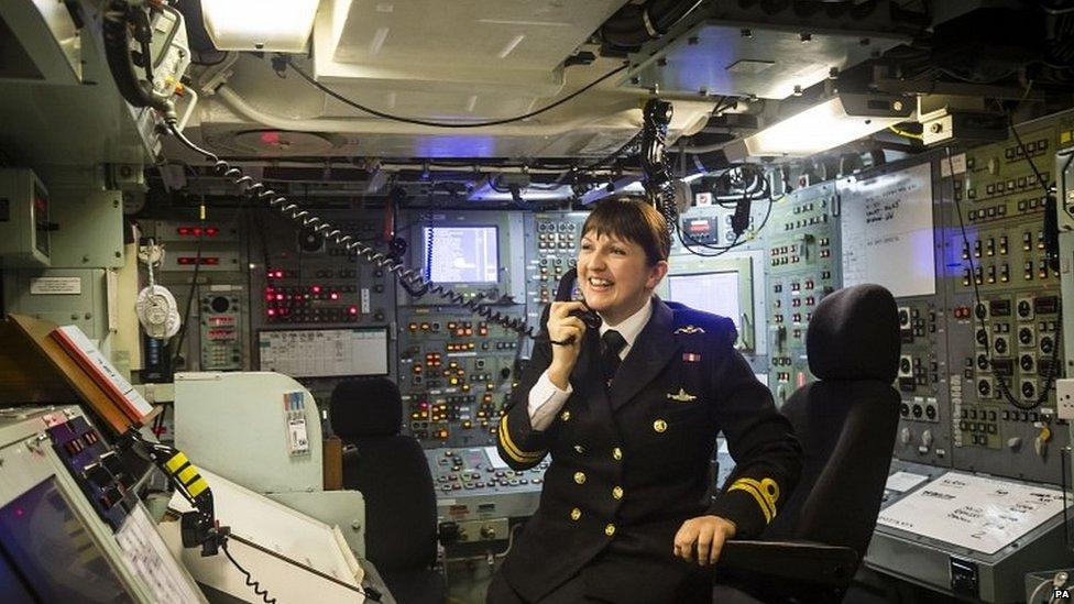 Alexandra Olsson in the control room on board Vanguard-class submarine HMS Vigilant