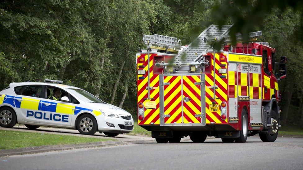 Police car and fire engine outside The Mount