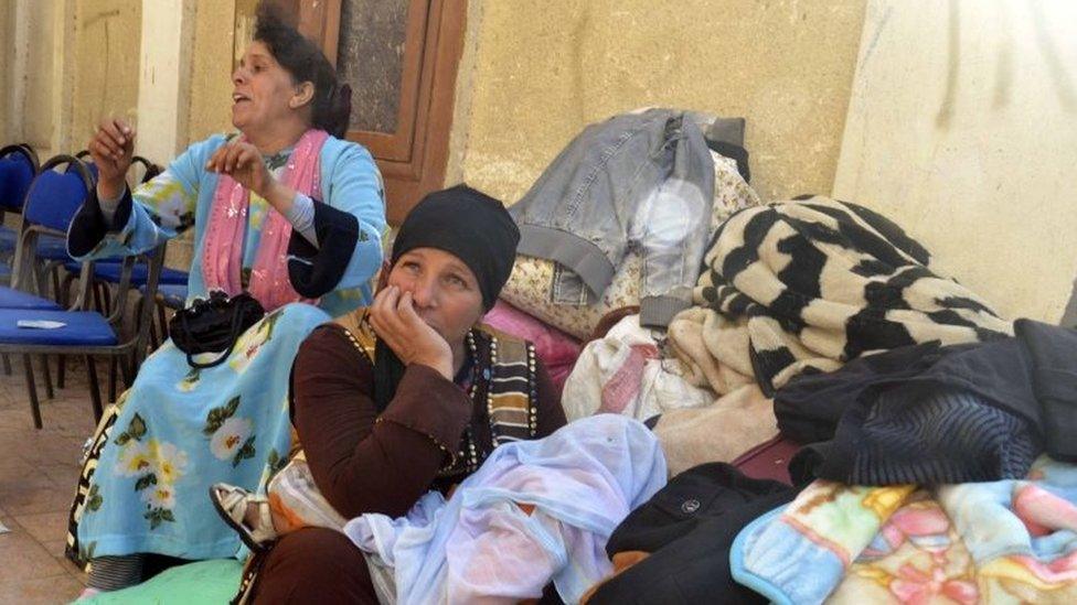 Coptic Christians sit in the courtyard of the Evangelical Church in Ismailiya, Egypt. Photo: 24 February 2017