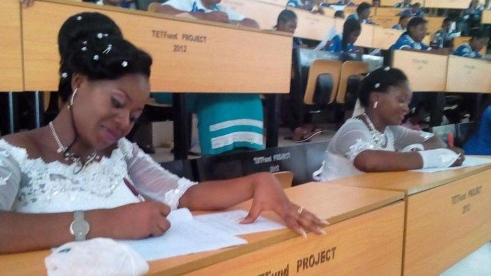 Dorcas Atsea and Deborah Atoh sit exam