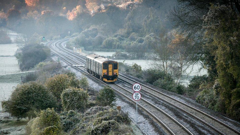 train on track in autumn