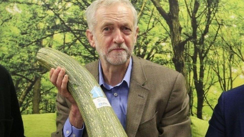 Jeremy Corbyn is presented with a marrow by local independent store during a visit to the Brighton