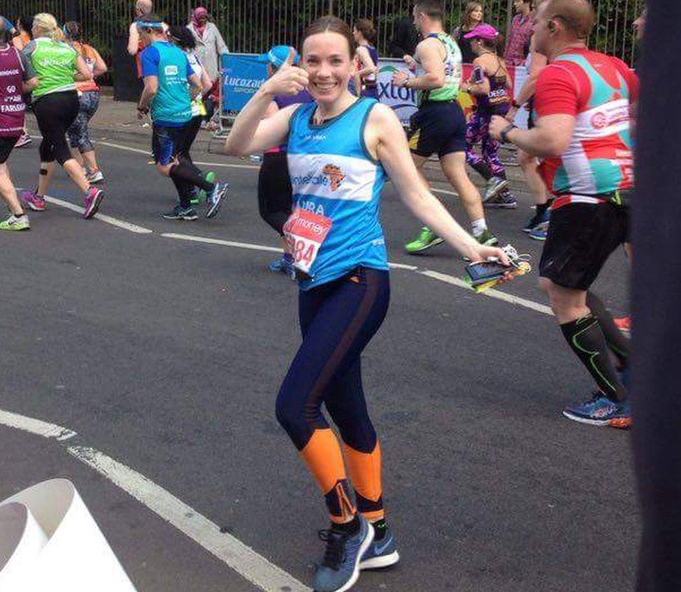 Laura Main gives the thumbs up, half way through the London marathon