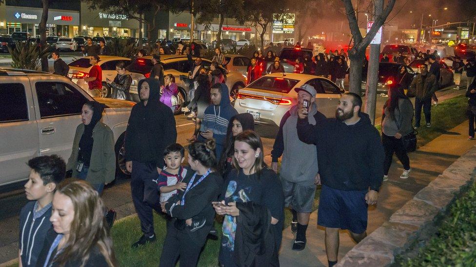 Protesters march towards the off-duty officer's home in Anaheim, California