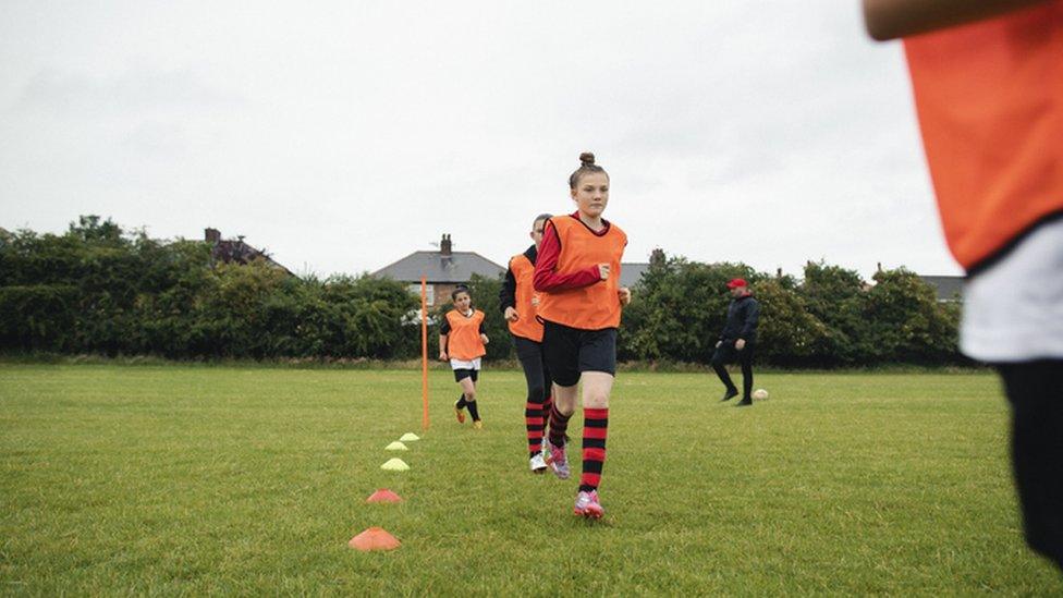 Girls training football