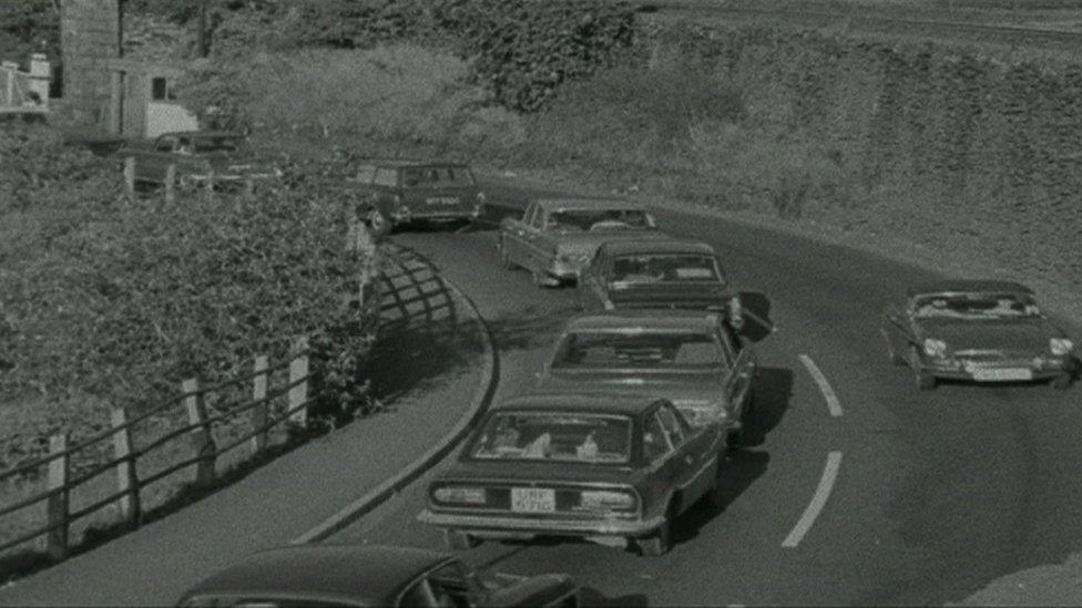 Cars queue on the Cob in Porthmadog in 1971