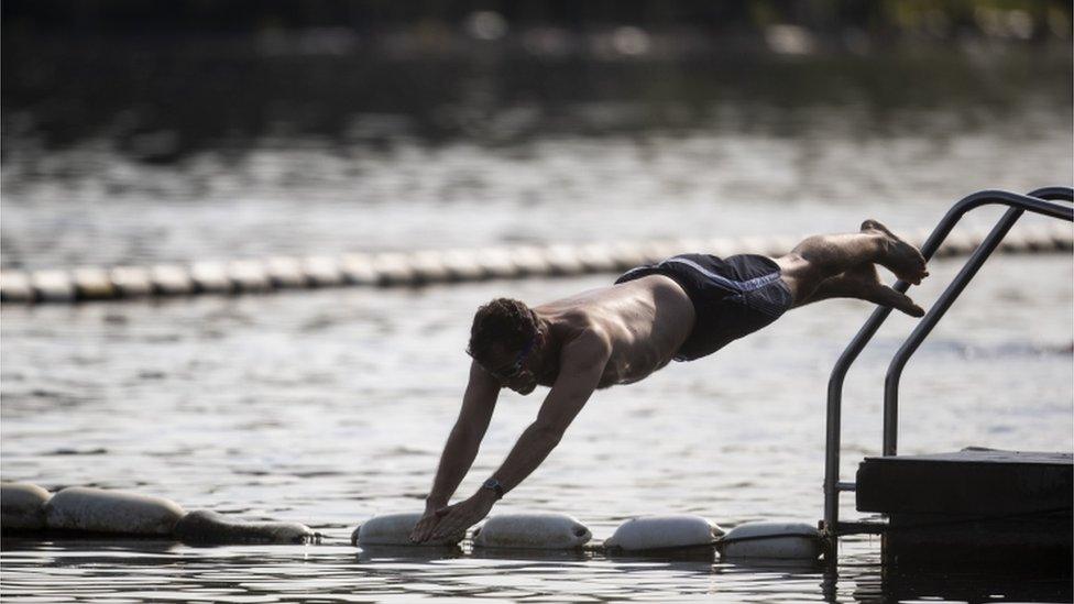 Some people in London's Hyde park were able to go swimming in the swimming section of the Serpentine Lake