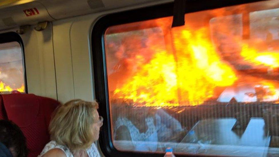 The fire through a train window