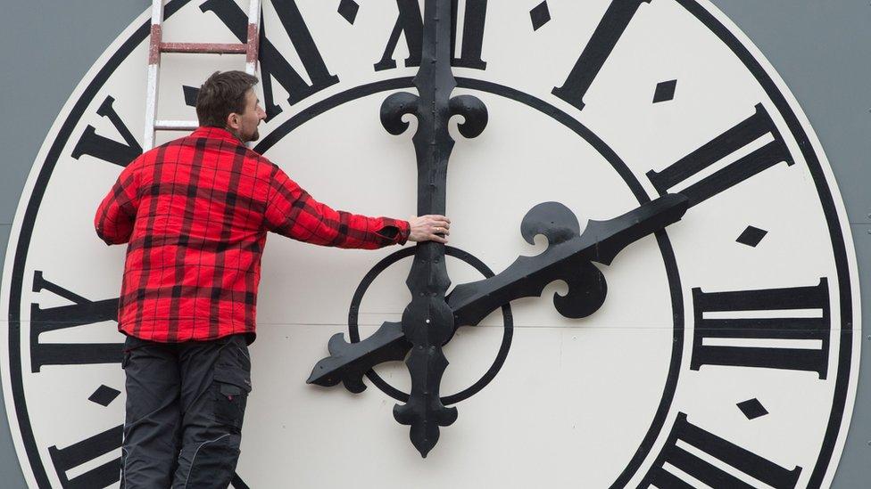 A man working on a clock in Dresden, eastern Germany