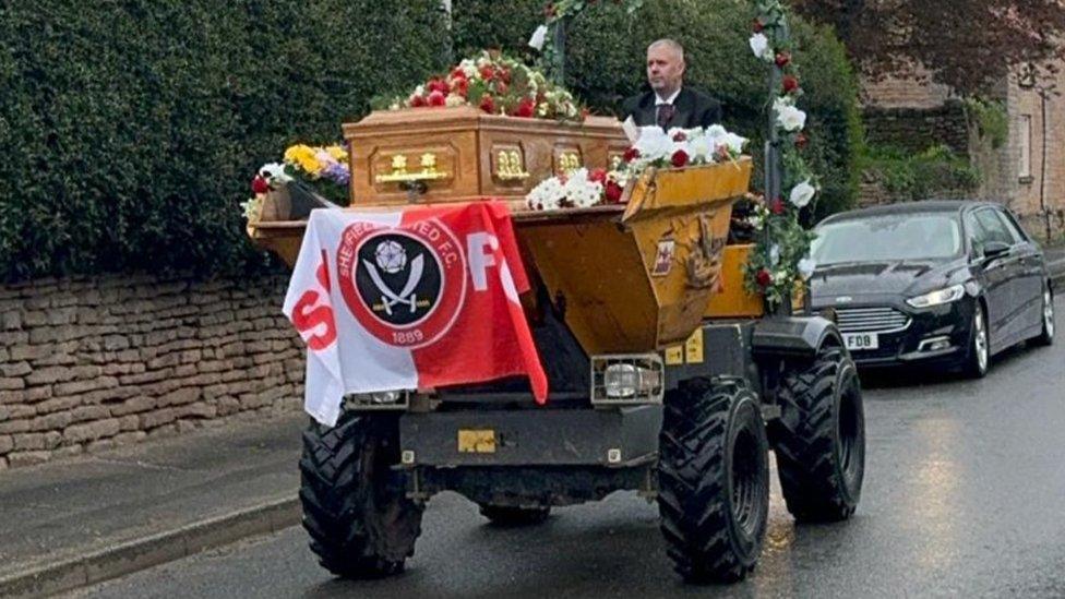 The coffin on its way to the funeral