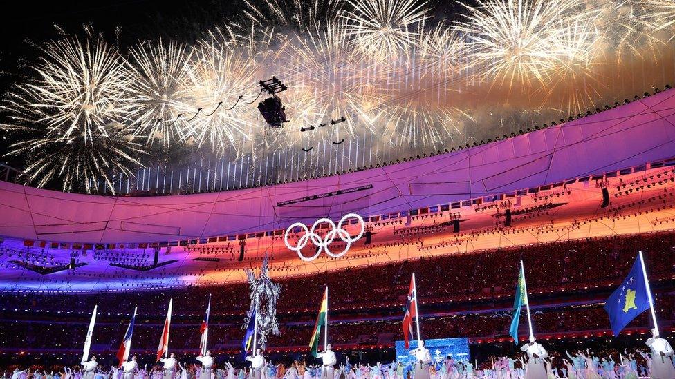 Fireworks explode over the National Stadium, during the Beijing 2022 Winter Olympics closing ceremony.