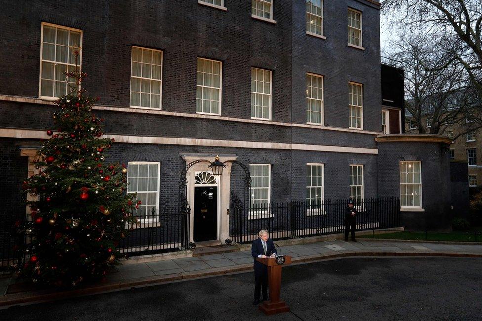 Britain's Prime Minister Boris Johnson delivers a speech outside 10 Downing Street i