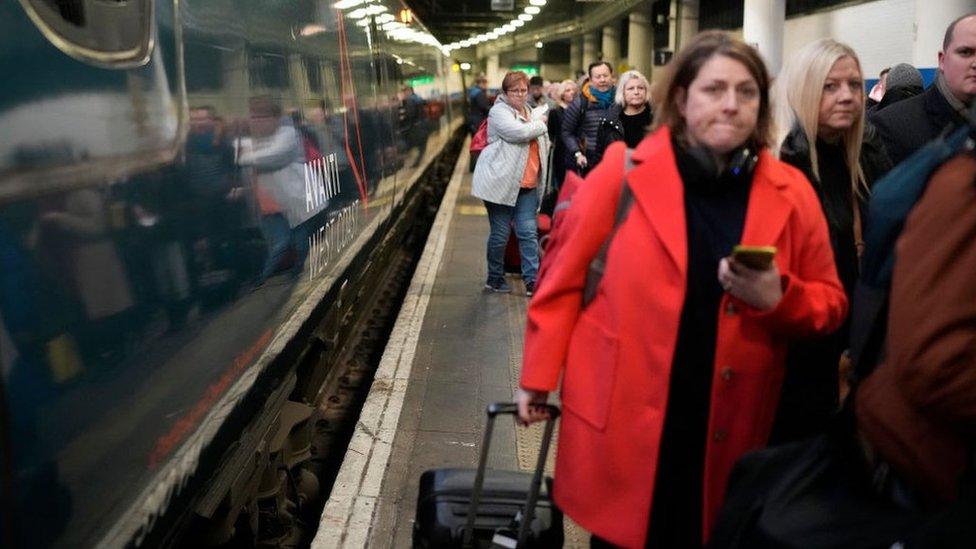 Passengers leaving a train