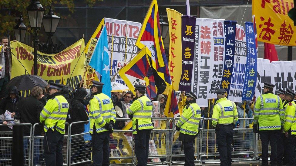 Protests holding banners on Whitehall