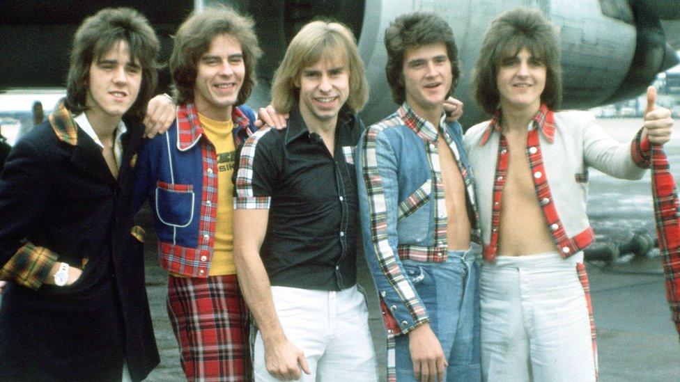 (Left to right) Stuart Wood, Alan Longmuir, Derek Longmuir, Les McKeown and Eric Faulkner of The Bay City Rollers at Heathrow Airport, London in 1975