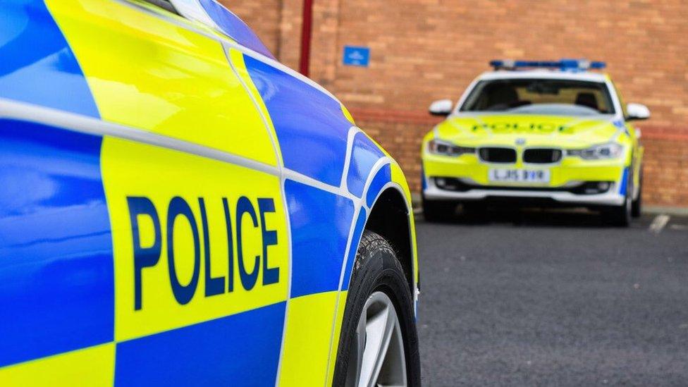 Stock image of two police cars