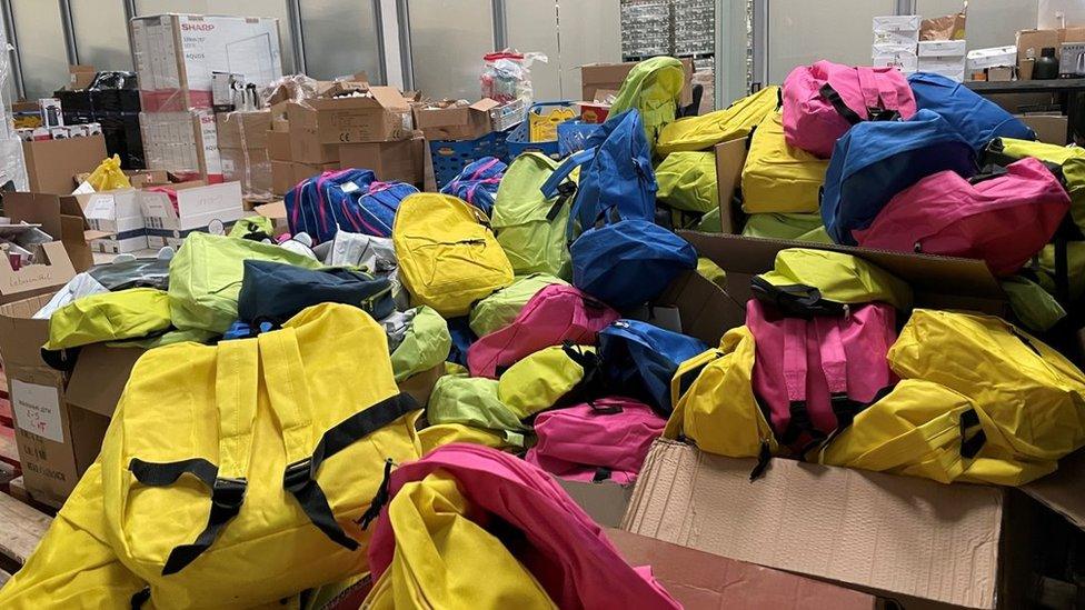 Backpacks in a warehouse