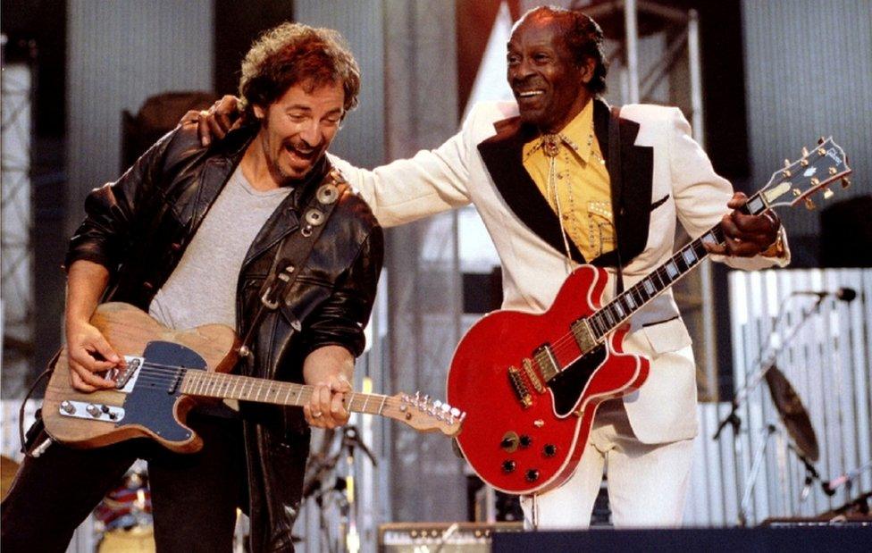 Bruce Springsteen and Chuck Berry perform "Johnny B. Good" to open The Concert for the Rock and Roll Hall of Fame on 2 September, 1995 at Cleveland Stadium.