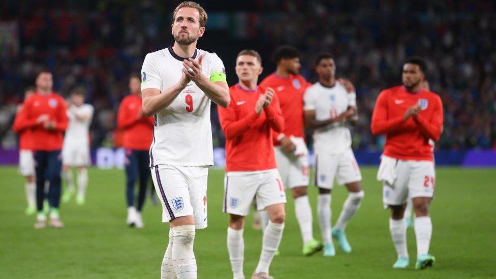 Harry Kane applauds fans