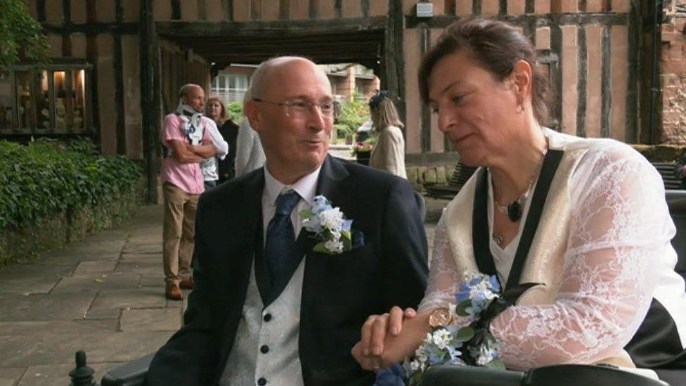 The couple outside the register office