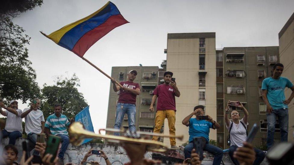 Supporters of Venezuelan presidential pre-candidate Maria Corina Machado take part in a political rally on an avenue in Maracay, Venezuela, 28 September 2023.