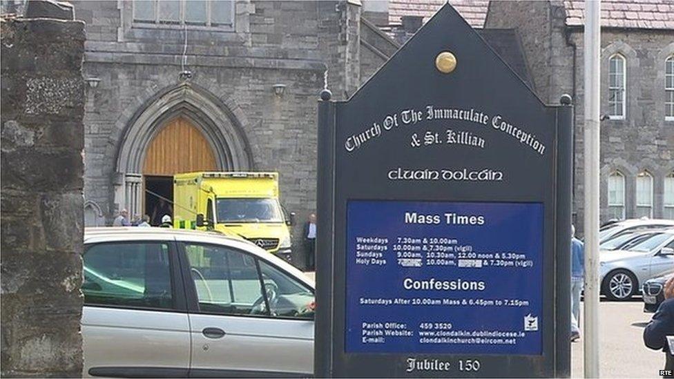 The church sign board with an ambulance