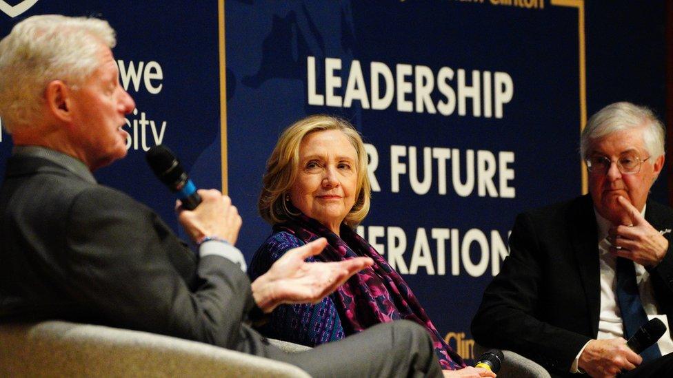 Hilary and Bill Clinton and Mark Drakeford on stage