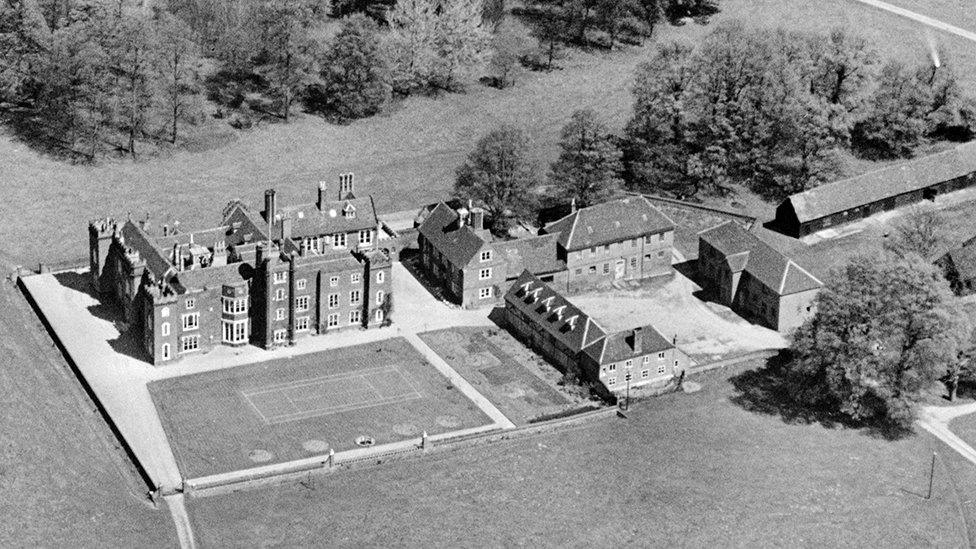 A cropped aerial photograph which shows the front view of Belhus manor house taken from the south, as it was in 1929