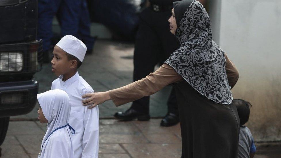 Relatives of a student who died outside the school in KL (14 Sept)