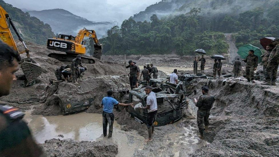 Rescue personnel at the site