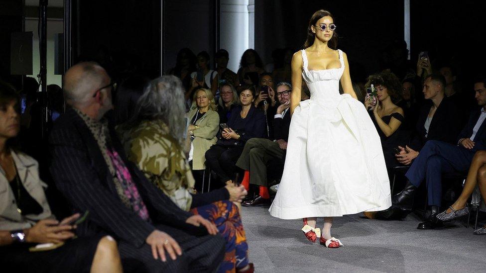 A model presents a creation by designer Andreas Kronthaler as part of his Spring/Summer 2024 Women's ready-to-wear collection show for fashion house Vivienne Westwood, during Paris Fashion Week in Paris, France, September 30, 2023