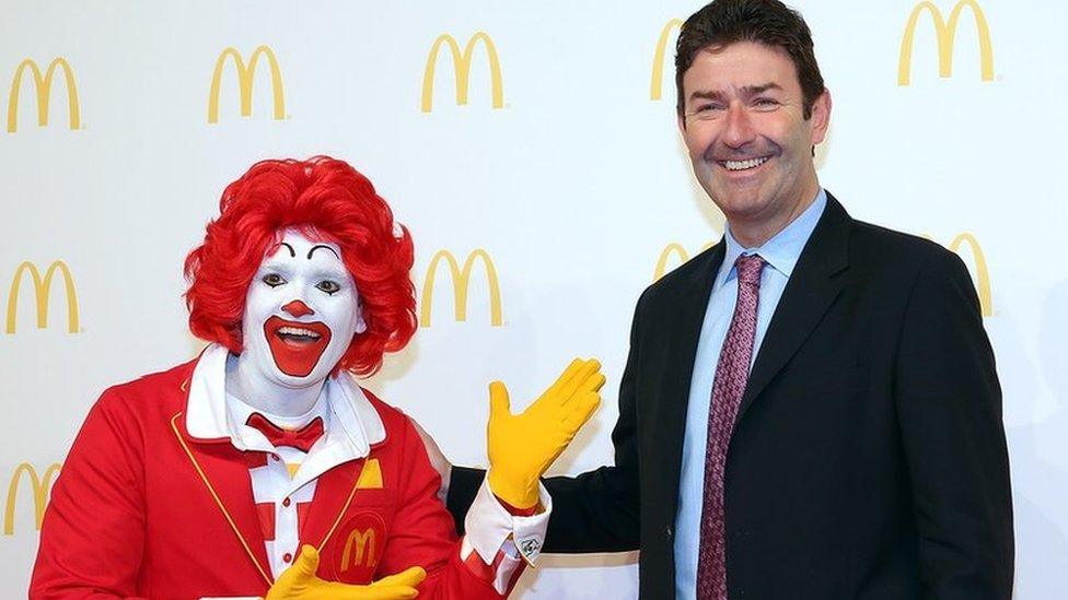 Steve Easterbrook, CEO McDonald, poses with Ronald McDonald during the new McDonald's Flagship Restaurant re-opening at Frankfurt International Airport, Terminal 2, on March 30, 2015 in Frankfurt am Main, Germany. (