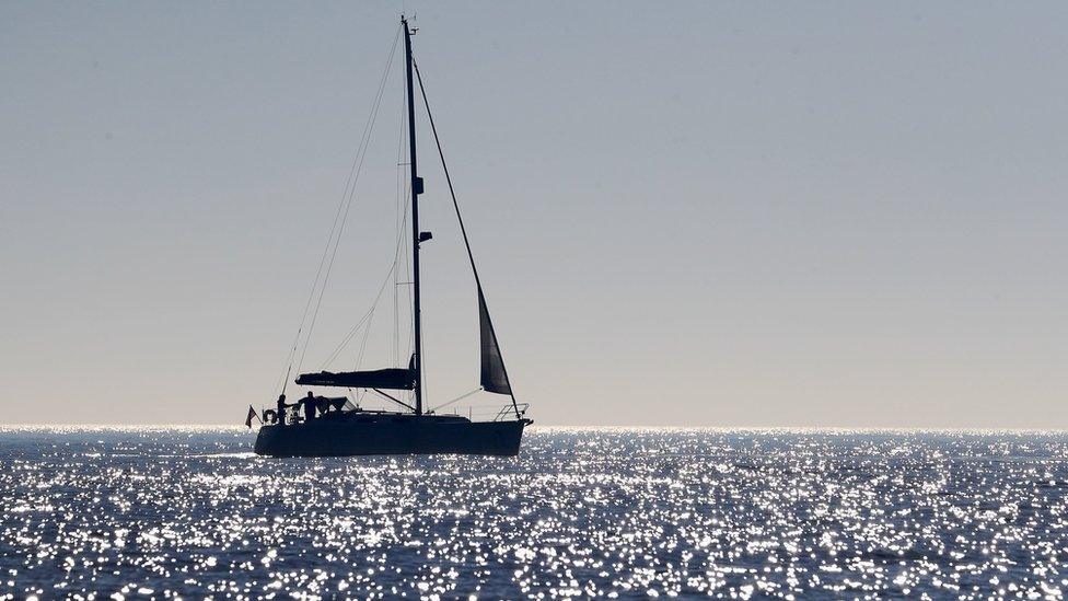 A sailing boat off the coast of Dungeness, Kent