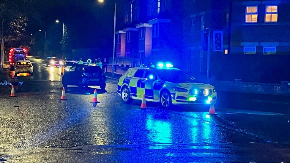 Police at the scene in Didsbury, Manchester