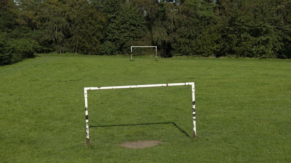 Goalposts in a field