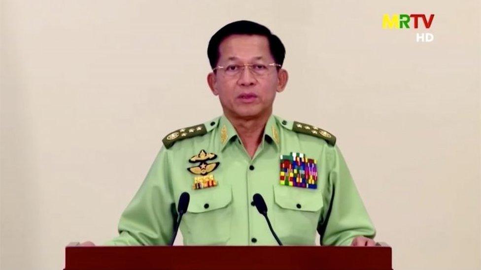 General Min Aung Hlaing holding a press conference in August 2021 extending his military government's rule under emergency powers