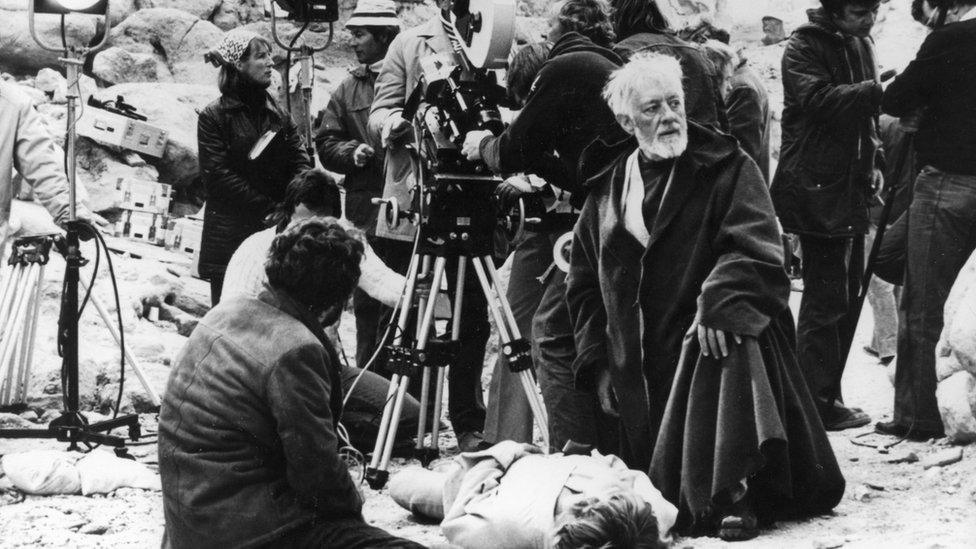 Alec Guinness and Mark Hamill shoot scene from Star Wars in Tunisian desert