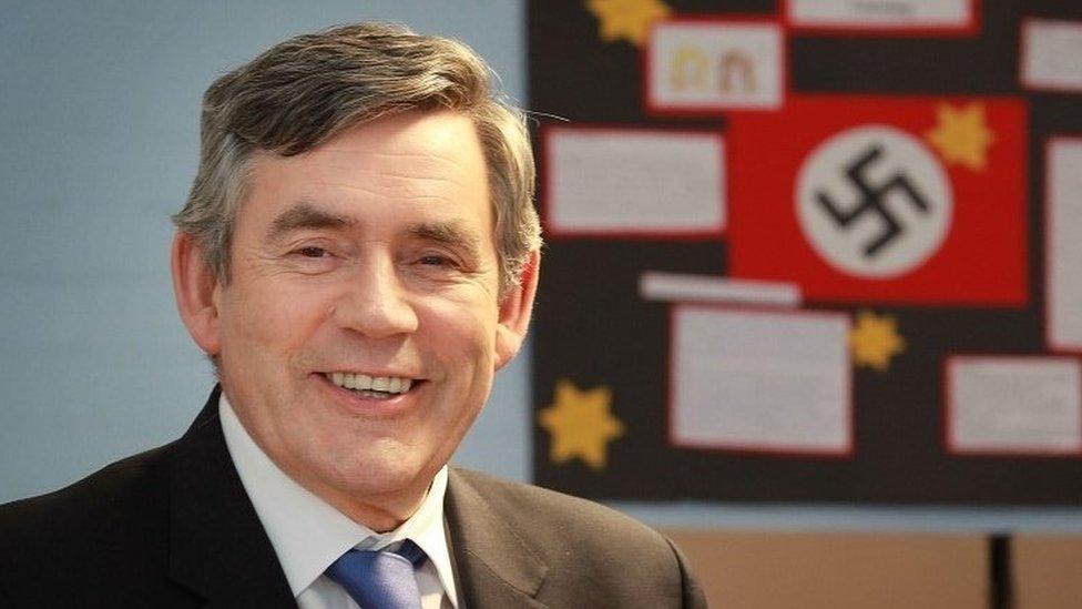 Gordon Brown next to a swastika