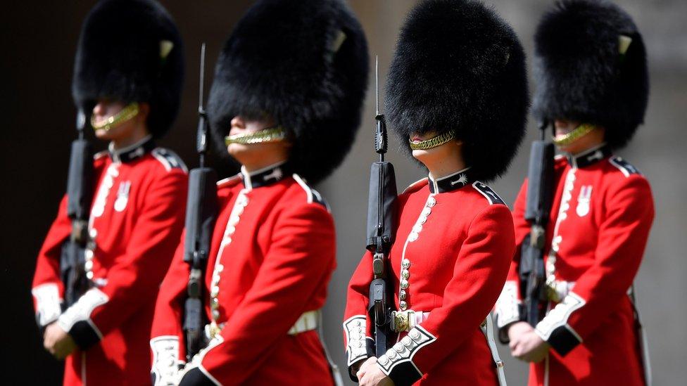 Members of the Welsh Guards perform in a ceremony to mark Britain"s Queen Elizabeth"s official birthday