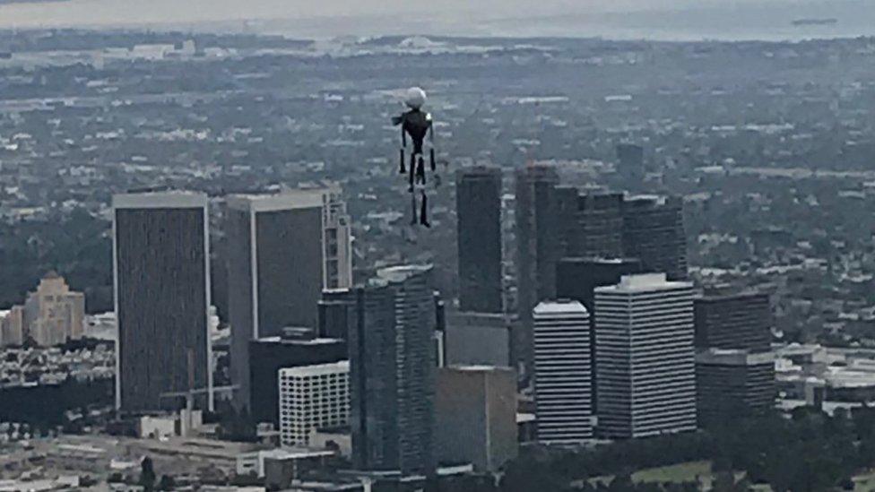 A police helicopter captured an inflatable Halloween decoration floating over LA