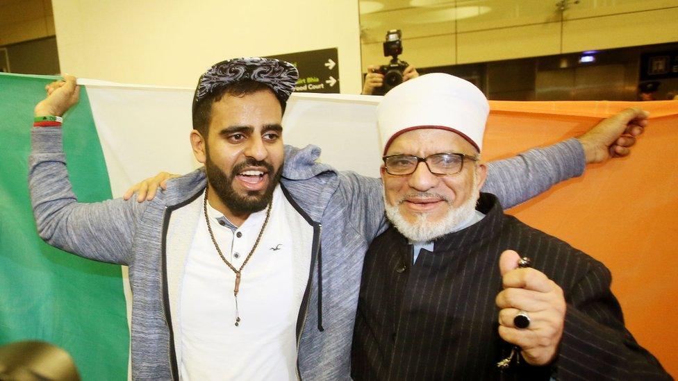 Ibrahim Halawa with his father at Dublin Airport