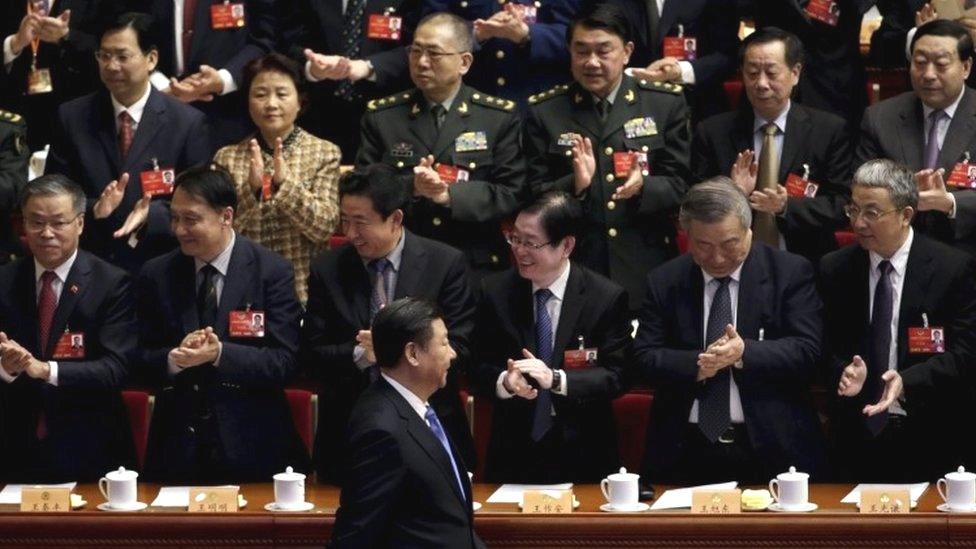 President Xi Jinping arrives for the closing ceremony of the Chinese People's Political Consultative Conference (CPPCC) at the Great Hall of the People, in Beijing (14 March 2016)