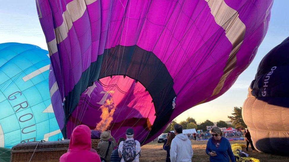 Hot air balloons preparing to take to the sky