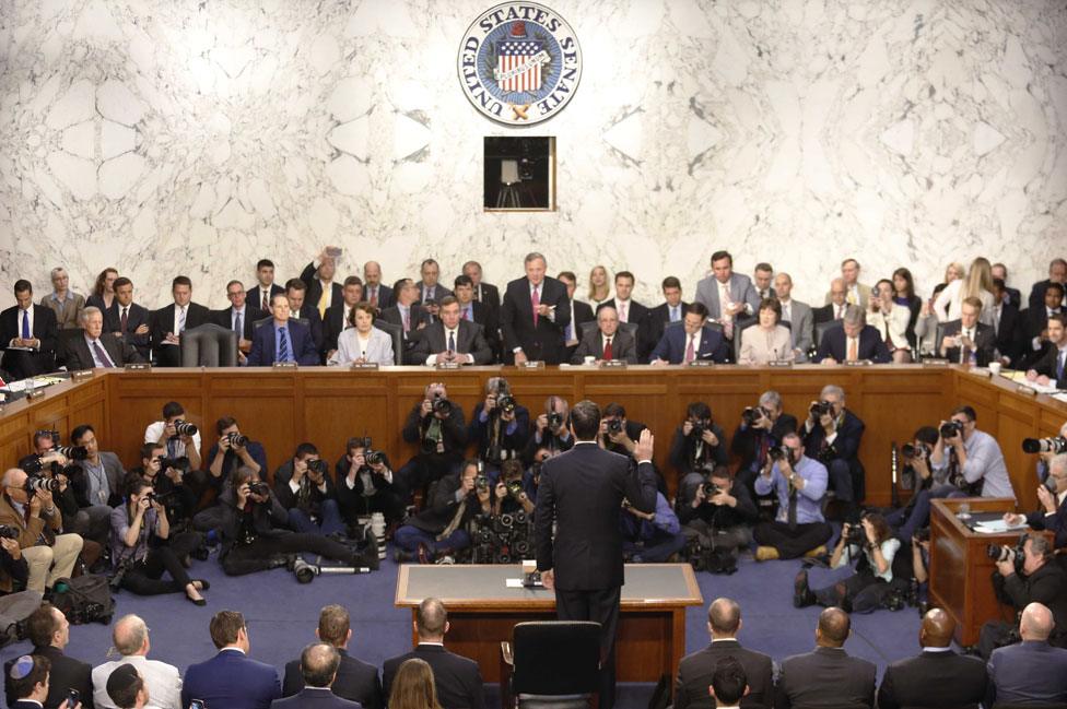 Comey takes the oath at hearing