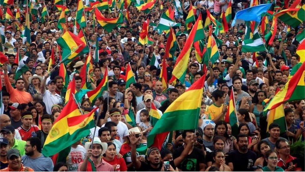 Bolivians celebrate the resignation of President Evo Morales, in La Paz, Bolivia, 10 November 2019.