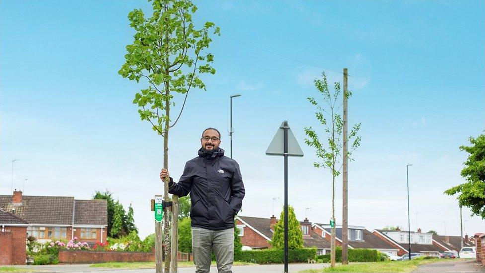 Man with a tree