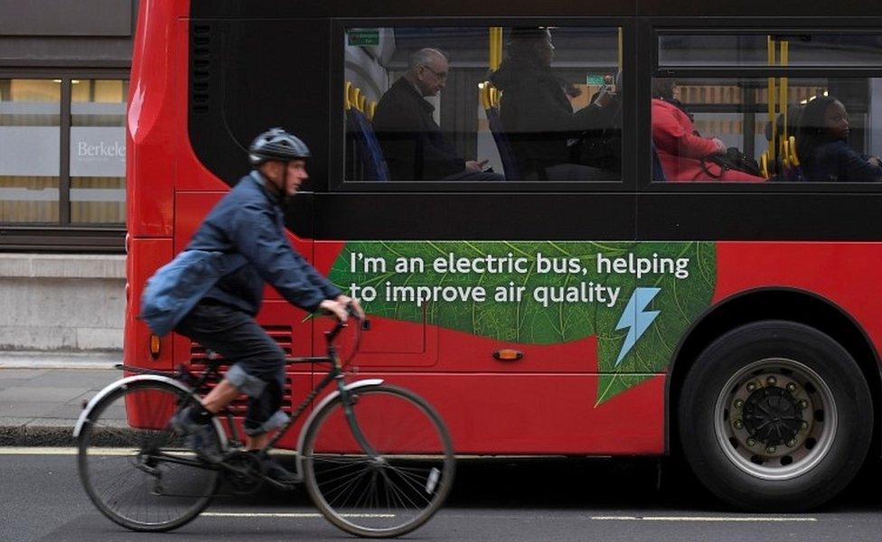 Cyclist and bus